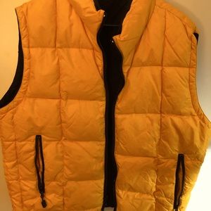 Large GAP yellow quilted puffer vest with down clusters.